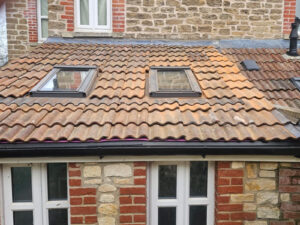 Single lap clay tiles on domestic property